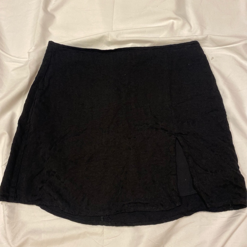 Black mini skirt with subtle leopard spots